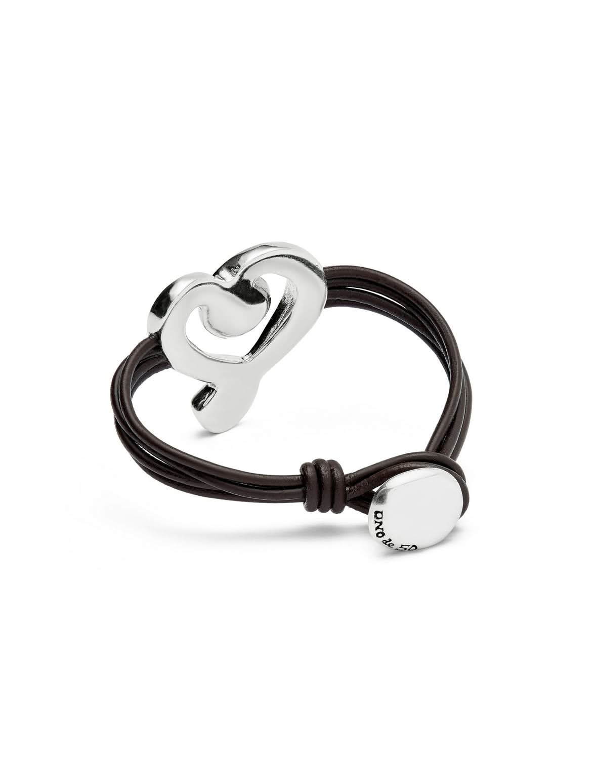 Sophisticated look at the Sterling Silver Plated Ser Expresiva Blue Bracelet PUL2542AZOMTL0 highlighting its unique heart design and vibrant blue gemstones, a statement in luxury jewelry.