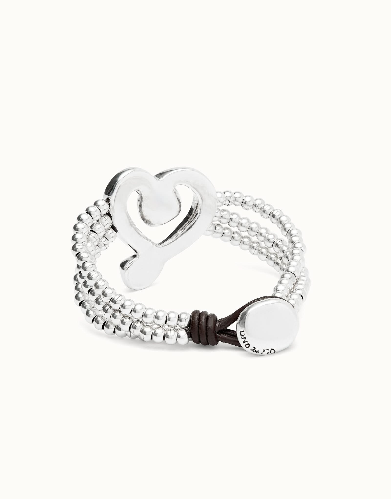 Sterling Silver Plated Ser Expresiva Black Bracelet, a luxurious bracelet featuring a unique design with sterling silver-plated heart and black crystal accents.