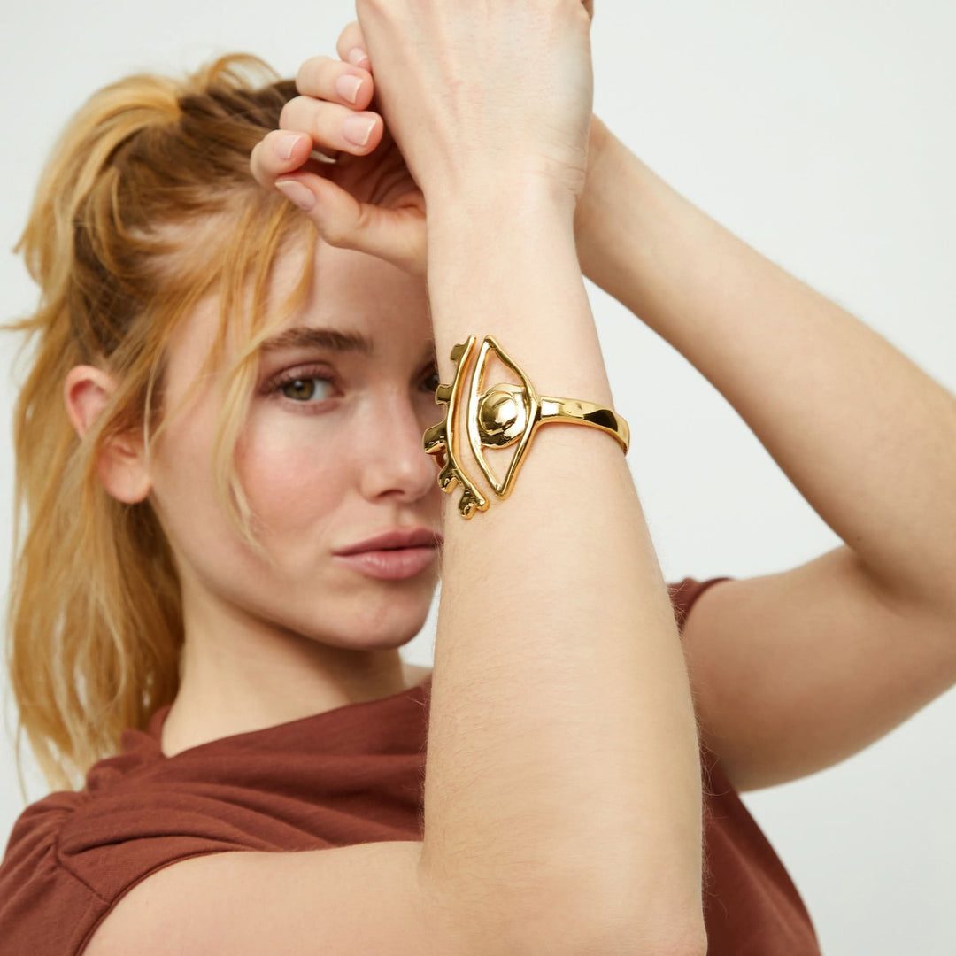 Metal Alloy Rigid Plated Gold 18K Striking Eye Detail Bangle Bracelet PUL2598ORO000