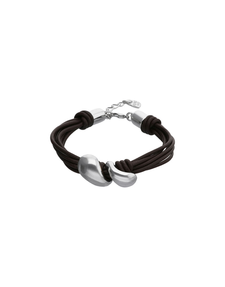A multi-strand dark brown cord bracelet with two polished silver-tone heart-shaped charms and a silver-tone lobster clasp, shown on a plain white background.