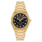 Gold wristwatch with a black face on a white background