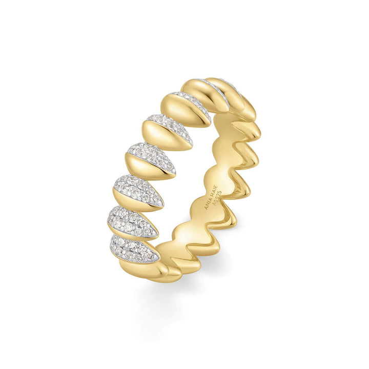 Gold and silver ring with a white background