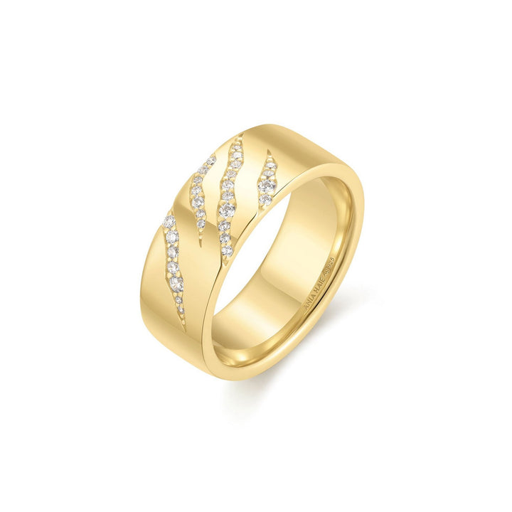 Gold ring with diamond accents on a white background