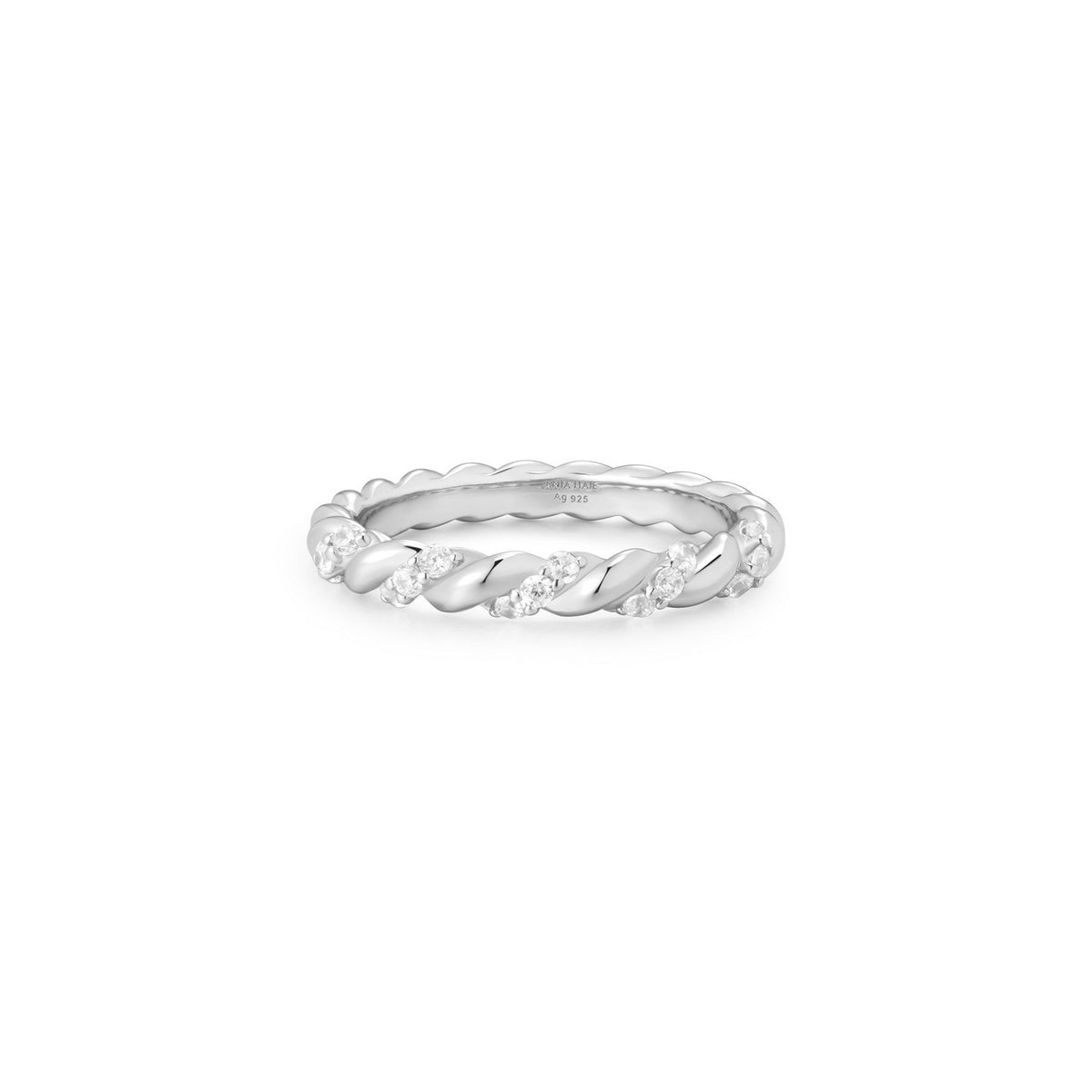 Silver ring with small diamonds on a white background