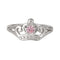 Silver tiara-shaped ring with a pink gemstone on a white background