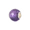 Faceted purple bead with silver core on a white background