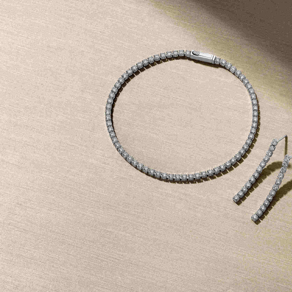 Luxurious 14k White Gold Diamante Diamond Bracelet SJ-B2563-WD-WG elegantly displayed with additional sparkling pieces, capturing the intricate details and craftsmanship of this exquisite bracelet.