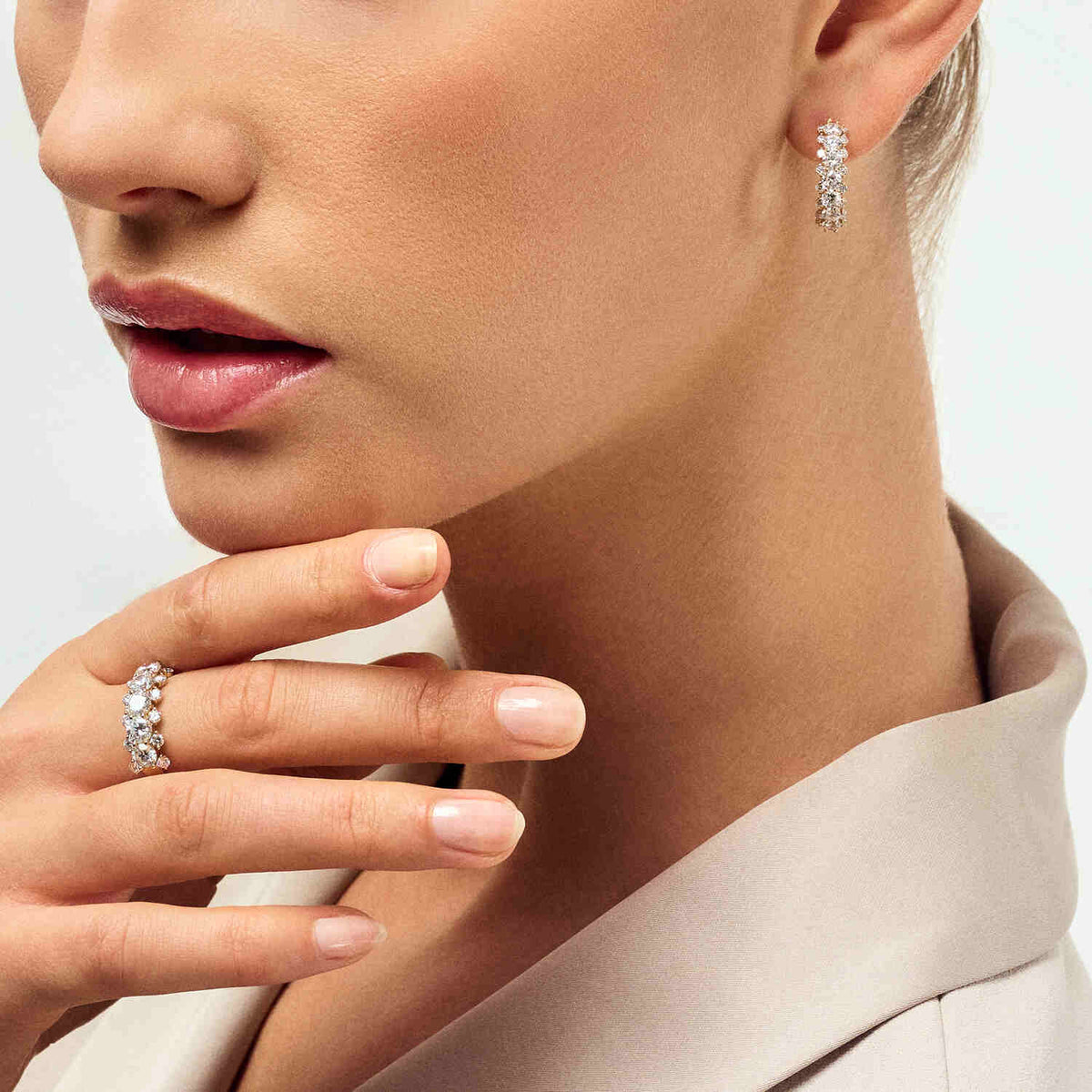 Close-up of the exquisite 14k Yellow Gold Fior Diamond Earrings SJ-E2523-WD-YG, showcasing the brilliance of round brilliant cut diamonds.