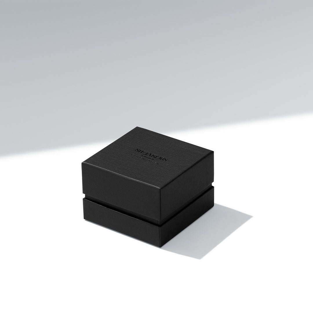 Black jewelry box with 'WAGNER' branding on a light gray background