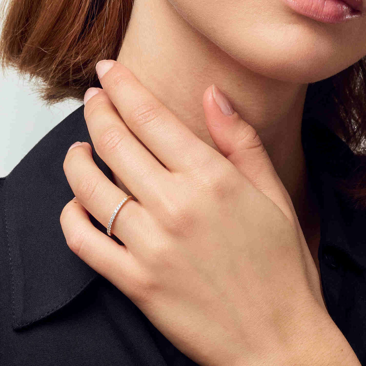 Close-up of a woman wearing the 14k White Gold Alba Diamond Ring SJ-R2515-WD-WG, highlighting the shimmering details of this luxurious ring set with lab-grown diamonds.