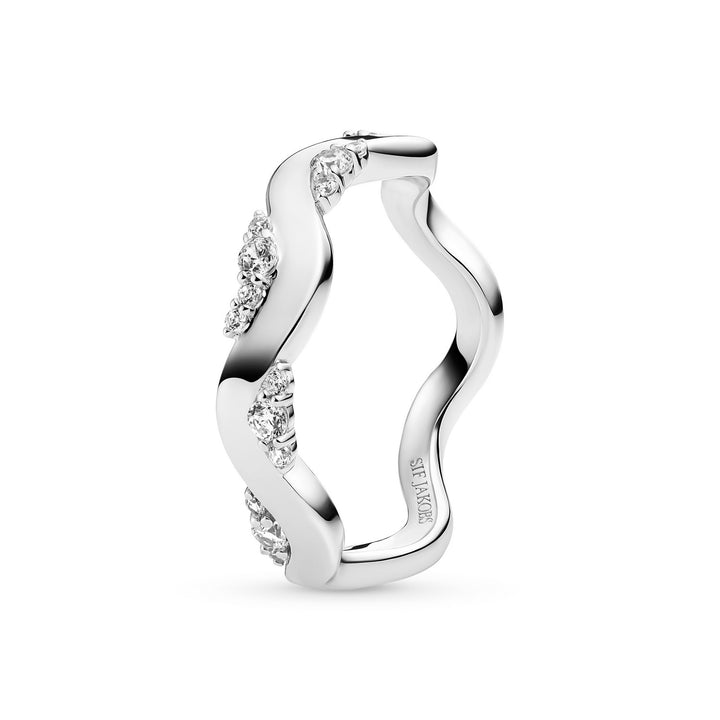 Silver ring with diamond accents on a white background