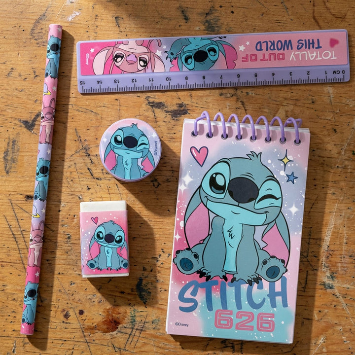 Stationery items featuring a character design on a wooden surface