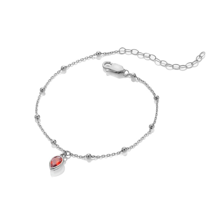 Silver bracelet with a red teardrop charm 