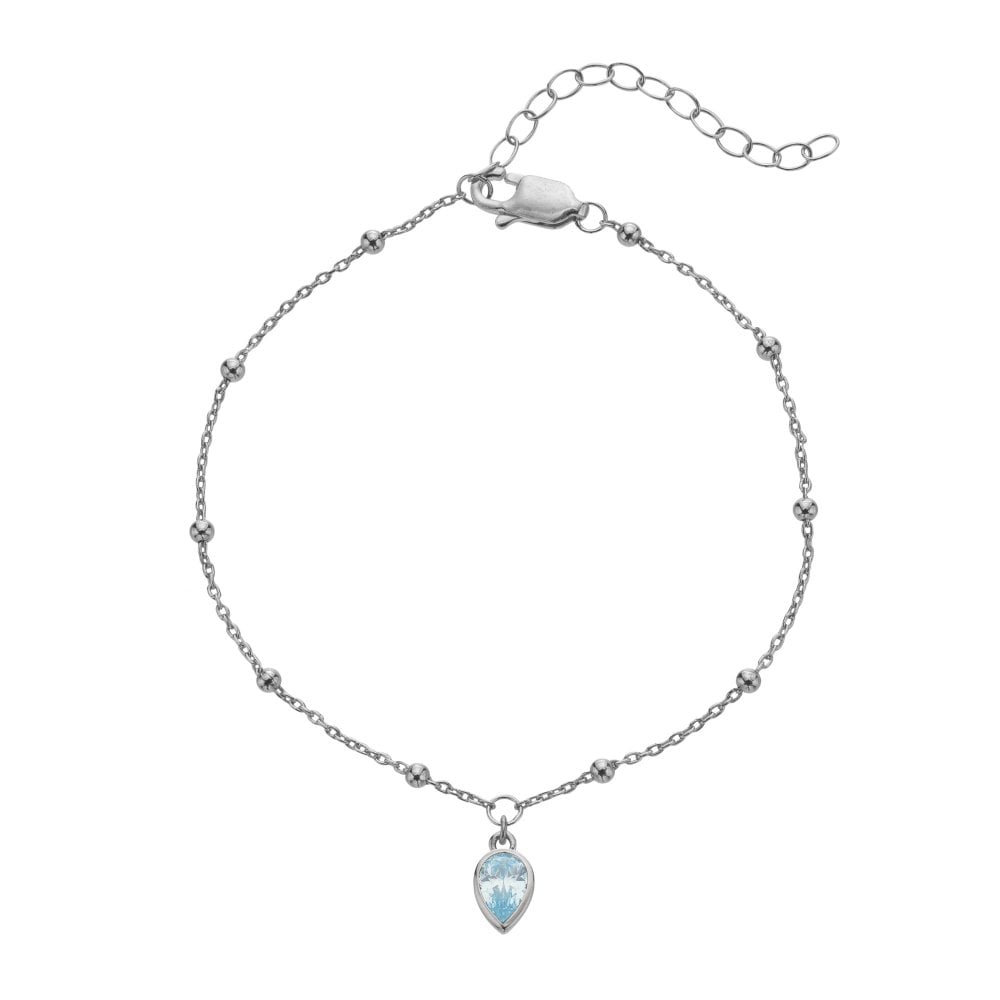 Silver bracelet with a teardrop-shaped blue gemstone 