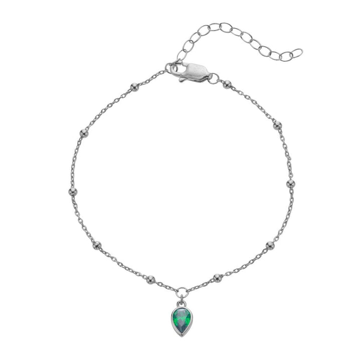 Silver bracelet with a green teardrop pendant 