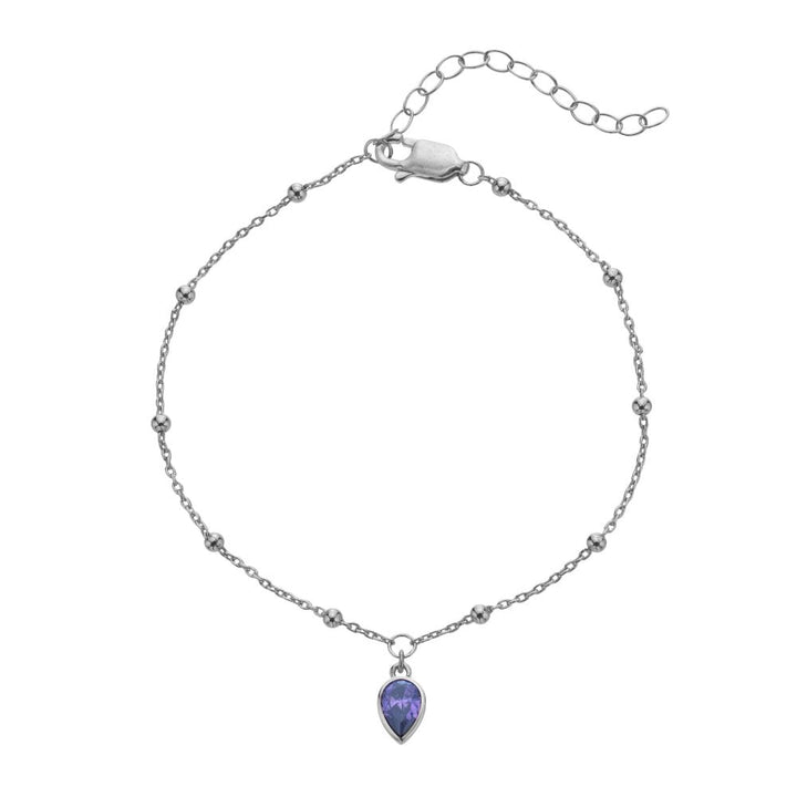 Silver bracelet with a purple teardrop pendant 