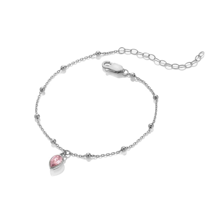 Silver bracelet with a pink heart charm 