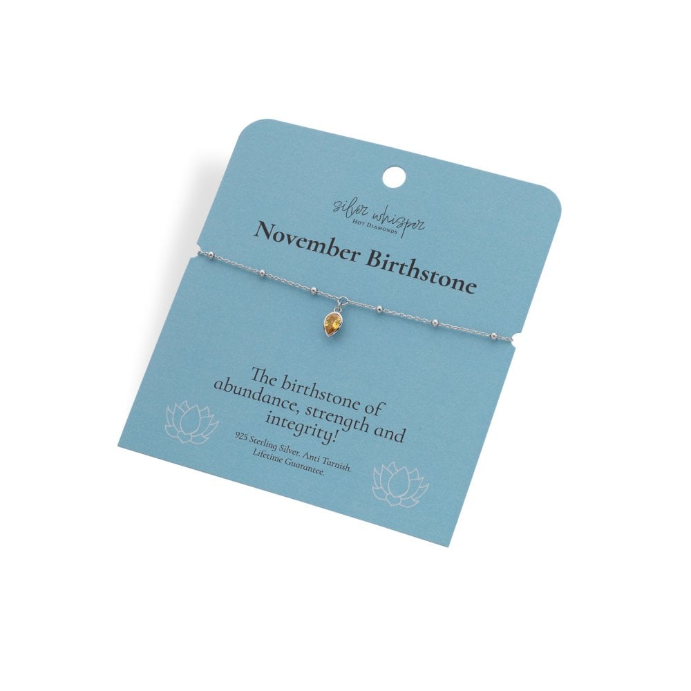 Bracelet with a November birthstone on a blue card with text