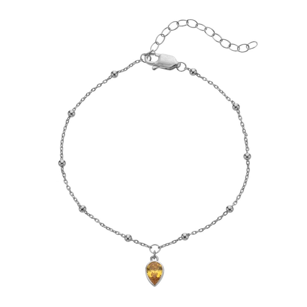 Silver bracelet with a teardrop-shaped amber pendant 