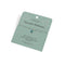 Bracelet with a blue gemstone on a green card with text about December birthstone