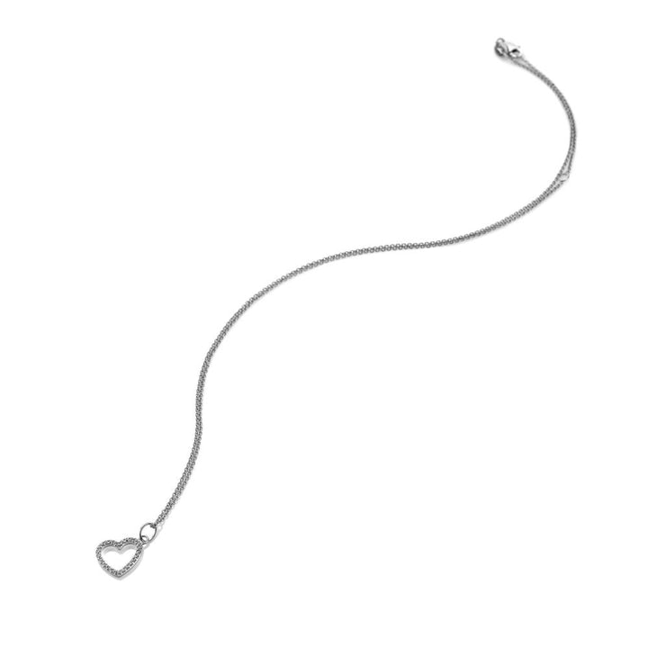 Silver bracelet with a heart-shaped charm 