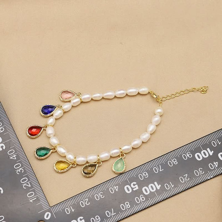 Seeds Pearl Bracelet with Rainbow Charms