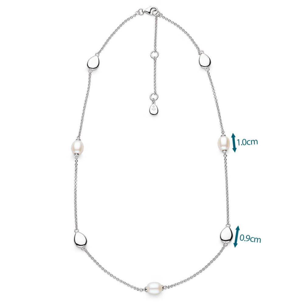 Silver necklace with pearls on a white background