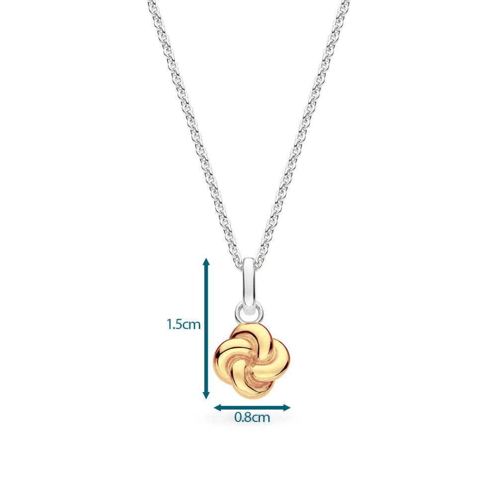 Gold knot pendant on a silver chain with measurements indicated.