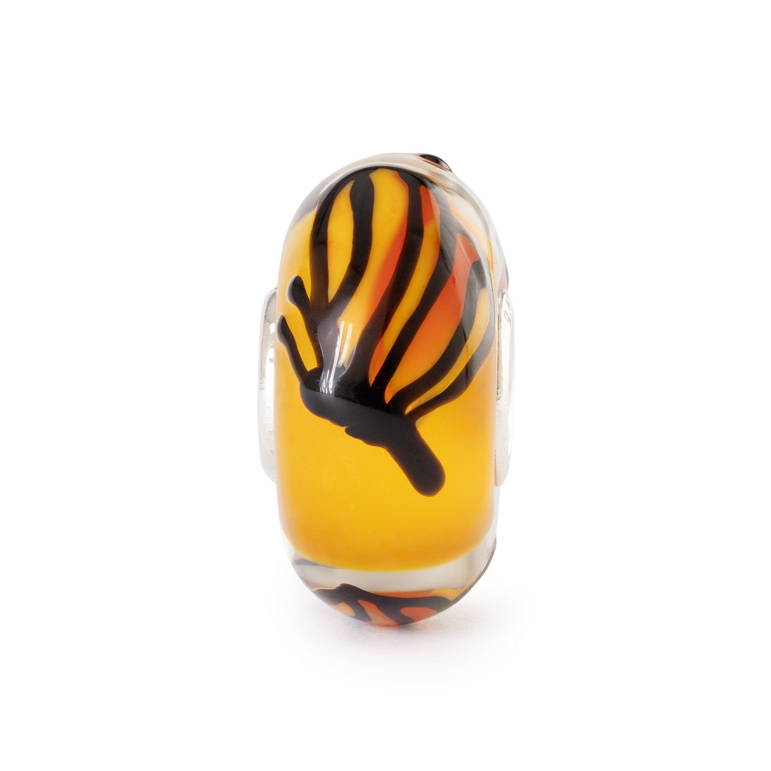 Glass charm with tiger stripe pattern on a white background
