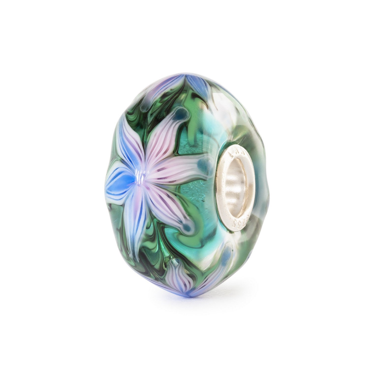 Decorative glass bead with floral design on a white background