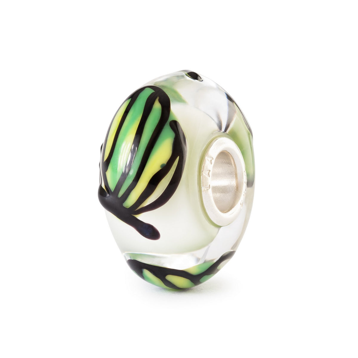 Glass charm bead with green and black swirl design on a white background