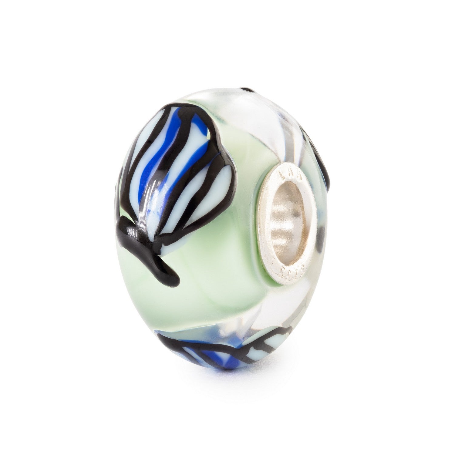 Glass charm with zebra pattern on a white background