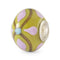 Decorative bead with floral patterns on a white background