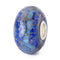 Blue glass bead with silver flecks on a white background
