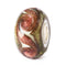 Multicolored glass bead with swirl pattern on a white background