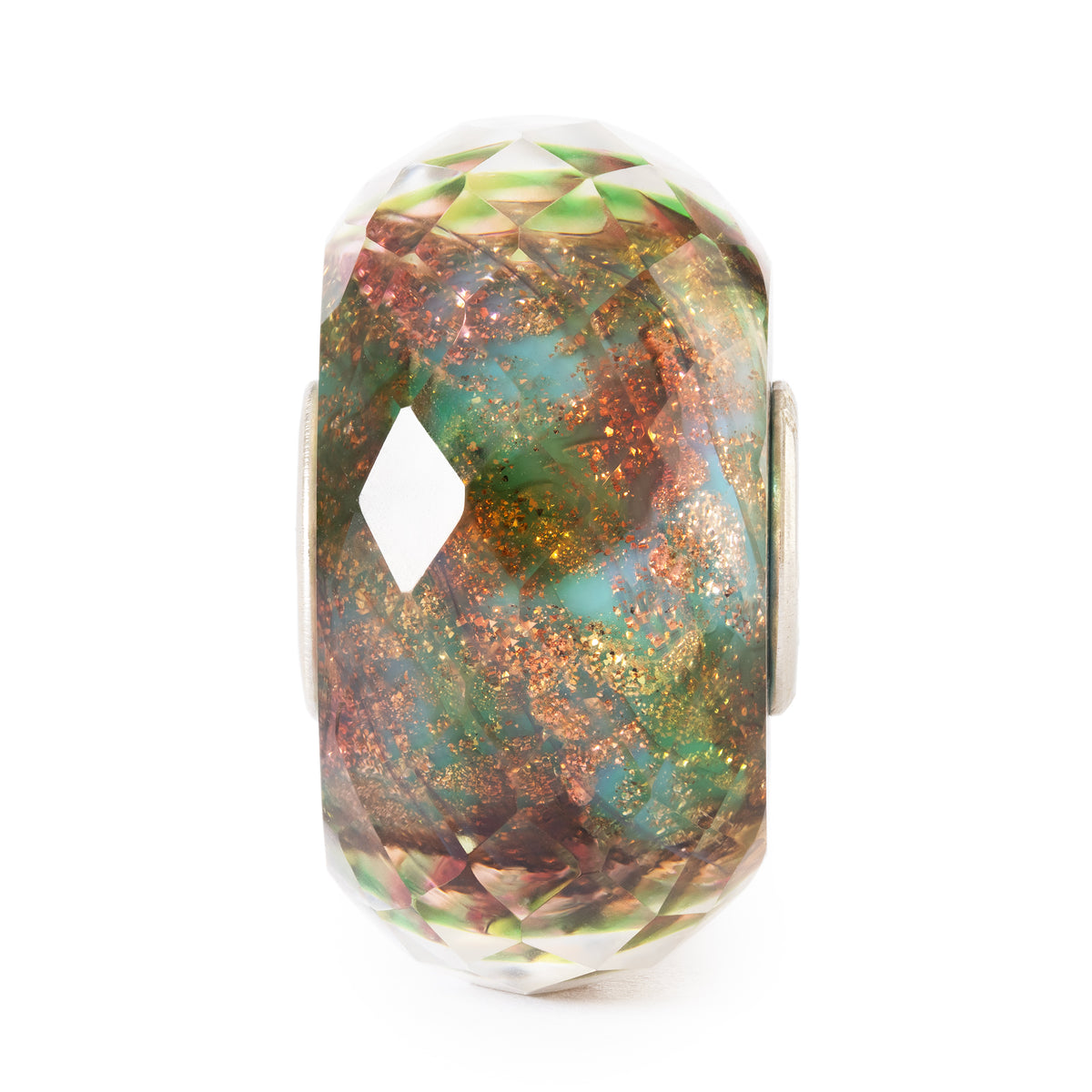 Multicolored glass bead with metallic flecks on a white background