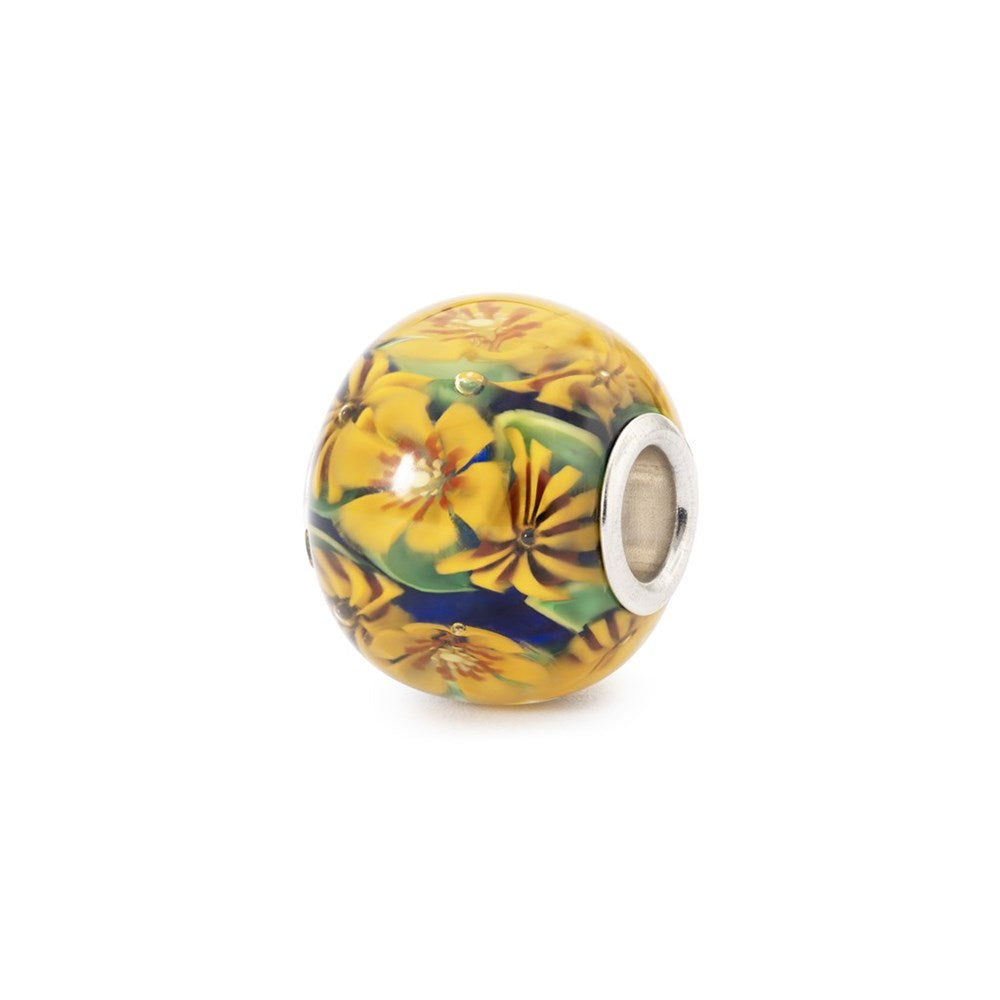 Floral-themed charm bead with silver clasp on a white background