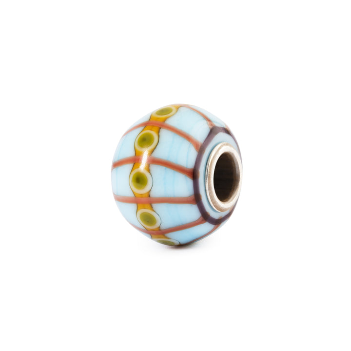 Multicolored glass bead on a white background