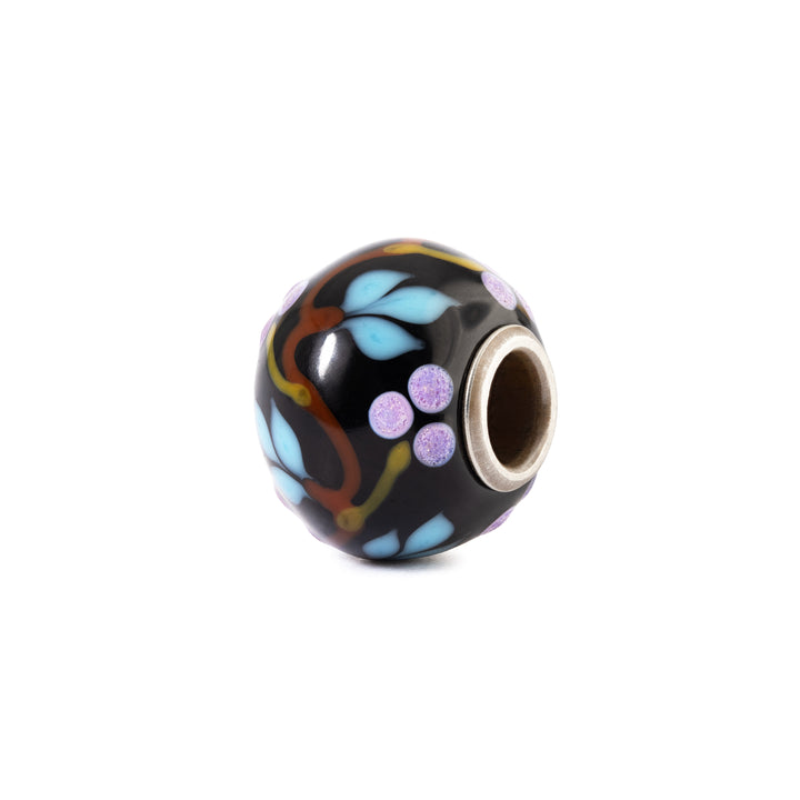 Multicolored glass bead on a white background