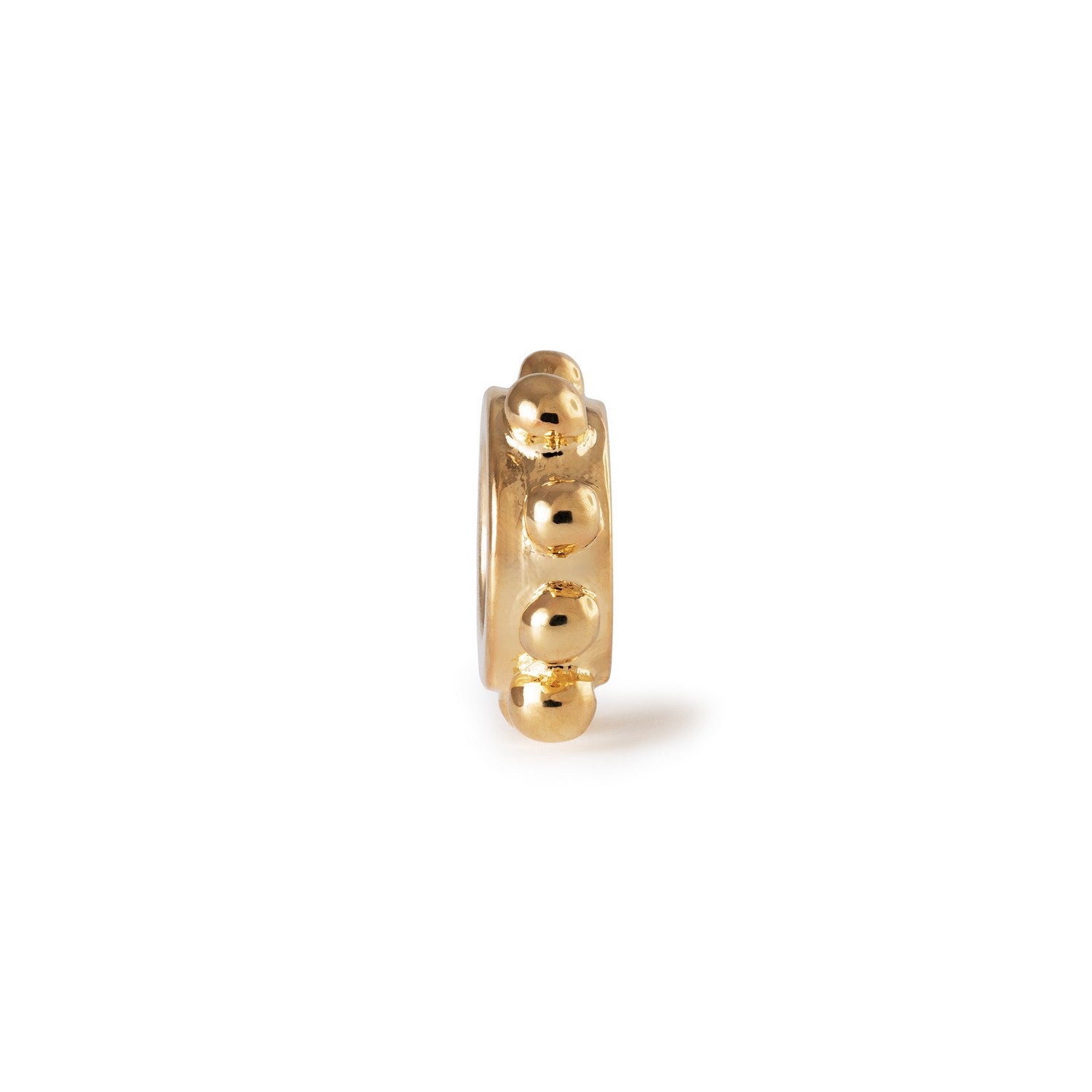 Gold beaded charm on a white background