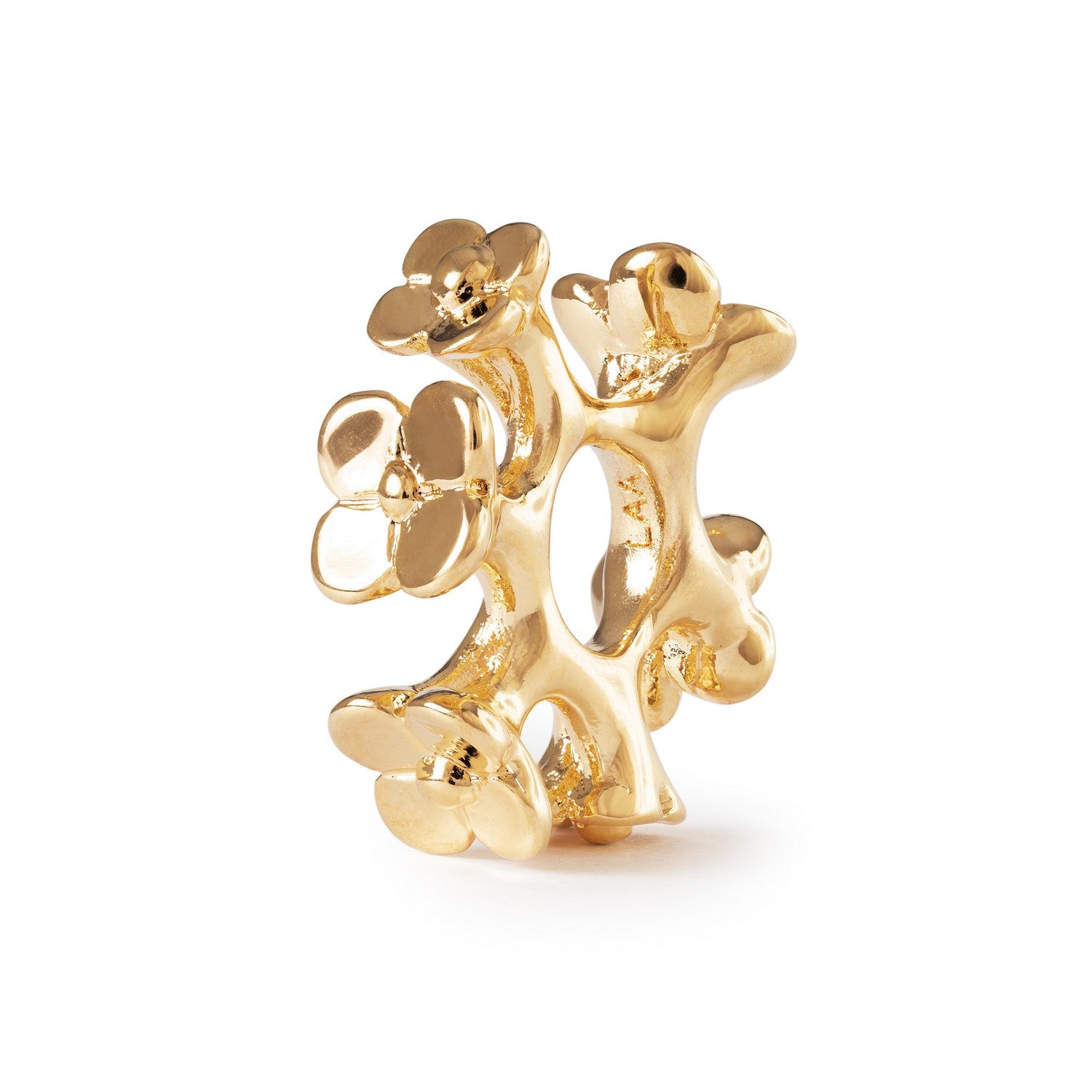 Gold floral earring on a white background