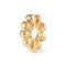 Gold decorative ring with a white background