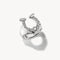 Silver horseshoe-shaped ring with embedded stones on a white background