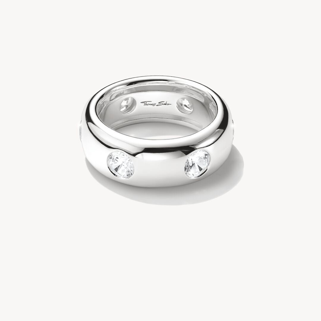 Silver ring with embedded diamonds on a white background