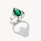 Silver ring with a green gemstone on a white background
