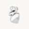 Silver ring with a clear gemstone on a white background