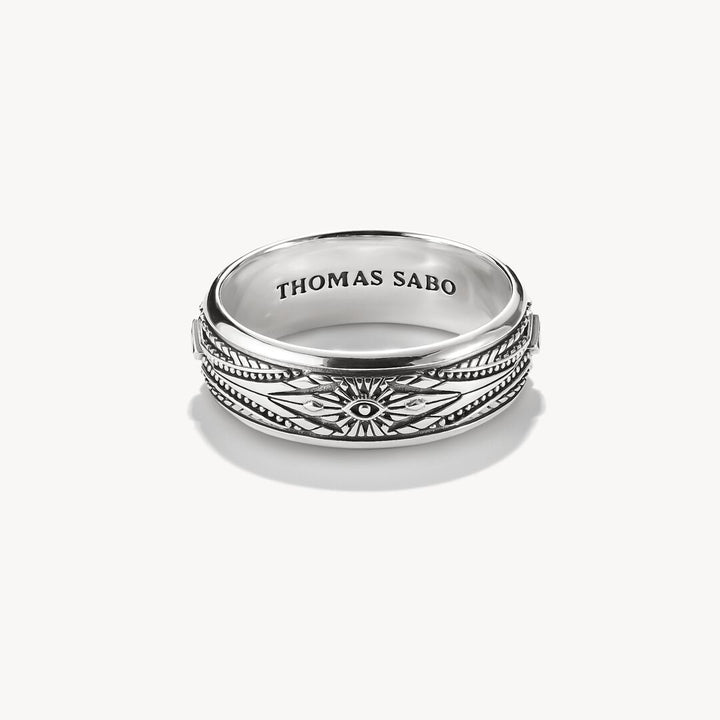 Silver ring with intricate design and 'THOMAS SABO' engraving on a white background