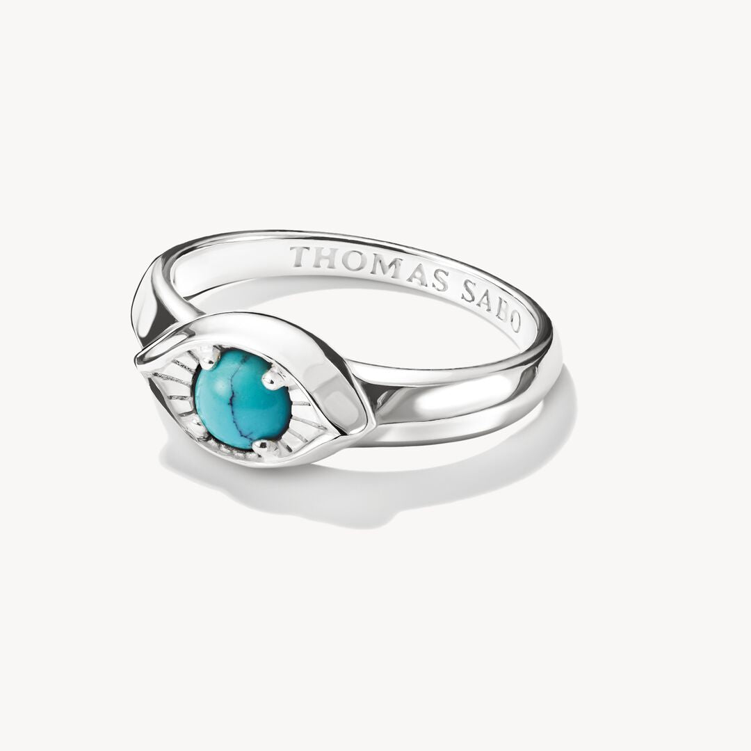 Silver ring with a turquoise stone on a white background, featuring the brand 'Thomas Sabo'.