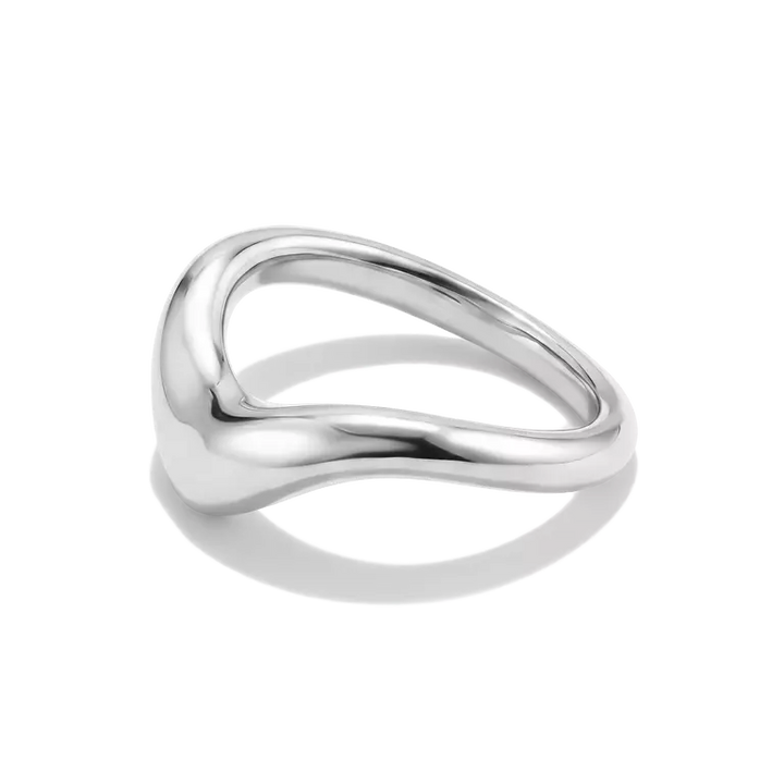 A polished silver ring with a fluid, wavy triangular design, shown on a clean white background with a soft shadow.