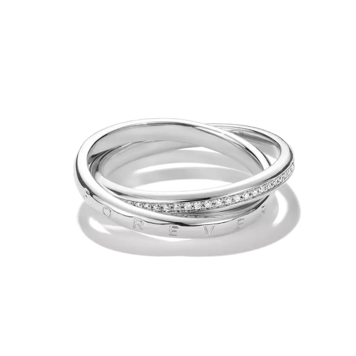 A silver twist ring with a pavé-set row of clear stones and an engraved 'FOREVER' on the inside, shown on a clean white background with a soft shadow.